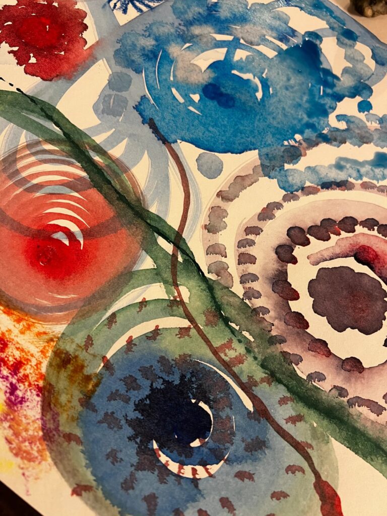 Close-up of colourful watercolour artwork