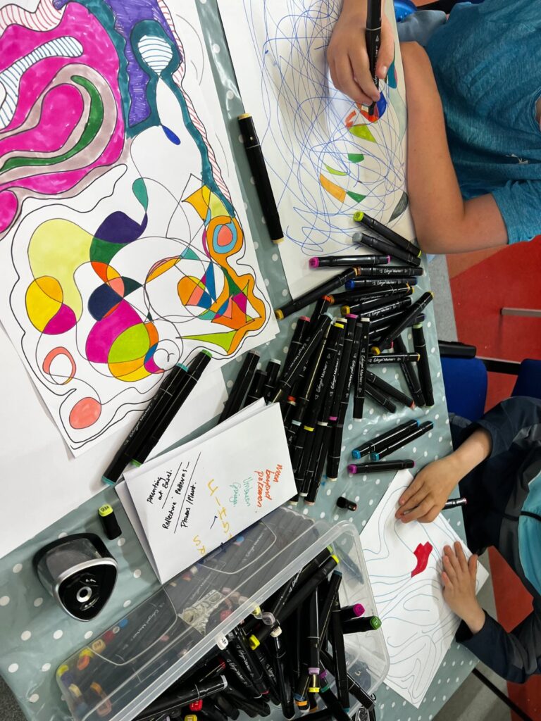 Colourful pattern drawing and pens